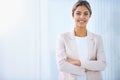 Business woman, arms crossed and smile in portrait, paralegal at law firm and confidence with pride. Young professional Royalty Free Stock Photo