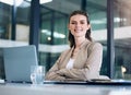 Business woman, arms crossed and working at desk with laptop, lawyer with confidence and smile in portrait. Professional Royalty Free Stock Photo