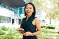 Business woman and asian portrait with smartphone for outdoor break at office building in Japan. Corporate Japanese girl Royalty Free Stock Photo