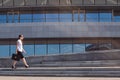 Business Woman with Attache Case Walking in City Royalty Free Stock Photo