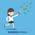 Business woman attracts money with a large magnet Royalty Free Stock Photo