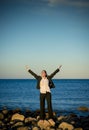 Business woman at the beach looking happy Royalty Free Stock Photo