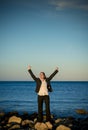 Business woman at the beach looking happy Royalty Free Stock Photo