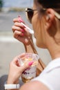 Business woman from behind eating healthy food Royalty Free Stock Photo