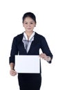 Business woman in black suit holding a blank sign board Royalty Free Stock Photo