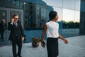 Business woman, bodyguard in suit on background