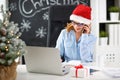 Businesswoman freelancer working at a computer at Christmas Royalty Free Stock Photo