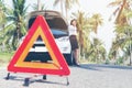 Business woman calling car insurance for assistance broken car on the road Royalty Free Stock Photo