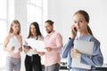 Business Woman calling on her mobile. Work in the office. Team leader. The concept of entrepreneurs, business and work on success Royalty Free Stock Photo