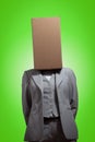 Business woman with a cardboard box head Royalty Free Stock Photo