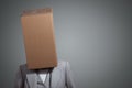 Business woman with a cardboard box head Royalty Free Stock Photo