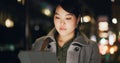 Business woman, city and tablet at night to scroll website, reading information and update app online. Japanese worker Royalty Free Stock Photo