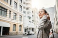 Business woman in city, travel and commute to work with buildings, motion blur and waiting for taxi cab. Corporate Royalty Free Stock Photo