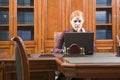 Business woman in classic wood working place