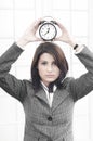 Business woman with a clock Royalty Free Stock Photo