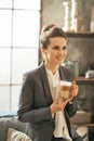 Business woman with coffee latte in loft Royalty Free Stock Photo