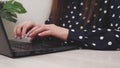 Business woman college university student using laptop computer at desk, female hands typing on notebook keyboard Royalty Free Stock Photo