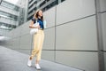 Business woman confident smiling with cloth bag holding steel thermos tumbler mug water glass Royalty Free Stock Photo