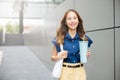 Business woman confident smiling with cloth bag holding steel thermos tumbler mug water glass Royalty Free Stock Photo