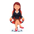 Business woman confidently sitting in office chair