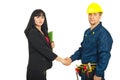 Business woman and constructor worker deal Royalty Free Stock Photo