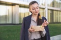 Business woman does not want to eat a salad with meat Royalty Free Stock Photo