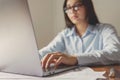 business woman doing accounting and finance on laptop in office