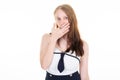 Business woman in a dress suit and tie surprised with her hand on her mouth blue eyes wide open Royalty Free Stock Photo