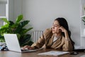 business woman entrepreneur in office using laptop at work, professional female company executive boring working on Royalty Free Stock Photo