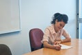 Business woman examining contract agreement in office Royalty Free Stock Photo