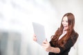 Business woman excited looking at Tablet pc Royalty Free Stock Photo