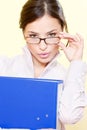 Business woman with file and eyeglasses