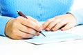 Business woman filling document. Royalty Free Stock Photo