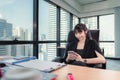 Business Woman Finance Accountant Using Mobile Phone for Chat Communicating While Working With Computer in Her Office Desktop, Royalty Free Stock Photo