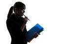 Business woman focused holding folders files silhouette Royalty Free Stock Photo
