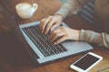 Business woman freelance sitting using working on his computer notebook laptop Royalty Free Stock Photo