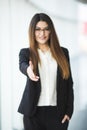 Business woman giving a hand. handshake in the office Royalty Free Stock Photo