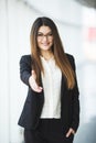 Business woman giving a hand. handshake in the office Royalty Free Stock Photo