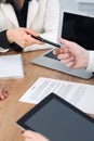 Business woman giving pen to businessman ready to sign contract. Success communication at meeting or negotiation Royalty Free Stock Photo