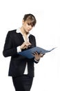 Business woman with glasses holding folder and reading document, isolated on white Royalty Free Stock Photo