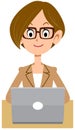 Business woman with glasses operating a personal computer Royalty Free Stock Photo