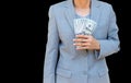 Business woman hand holding American dollar Currency on