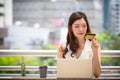 Business woman hand holding credit card using laptop shopping online Royalty Free Stock Photo