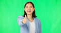 Business woman, hand and thumbs up on green screen for agreement, winning or success against a studio background Royalty Free Stock Photo