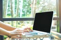 Business woman hand working with a laptop computer blank black s Royalty Free Stock Photo