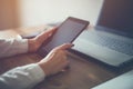 Business woman hand working laptop computer on wooden desk. Royalty Free Stock Photo