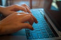 Business woman hands typing  keyboard on laptop working with blank screen on desk in cafe Royalty Free Stock Photo