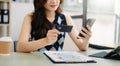 Business woman hands using smartphone and holding credit card as Online shopping Royalty Free Stock Photo