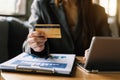 Business woman hands using smartphone and holding credit card with digital layer effect diagram as Online shopping Royalty Free Stock Photo