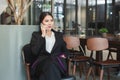 Business woman happy talking mobile phone in office spaces